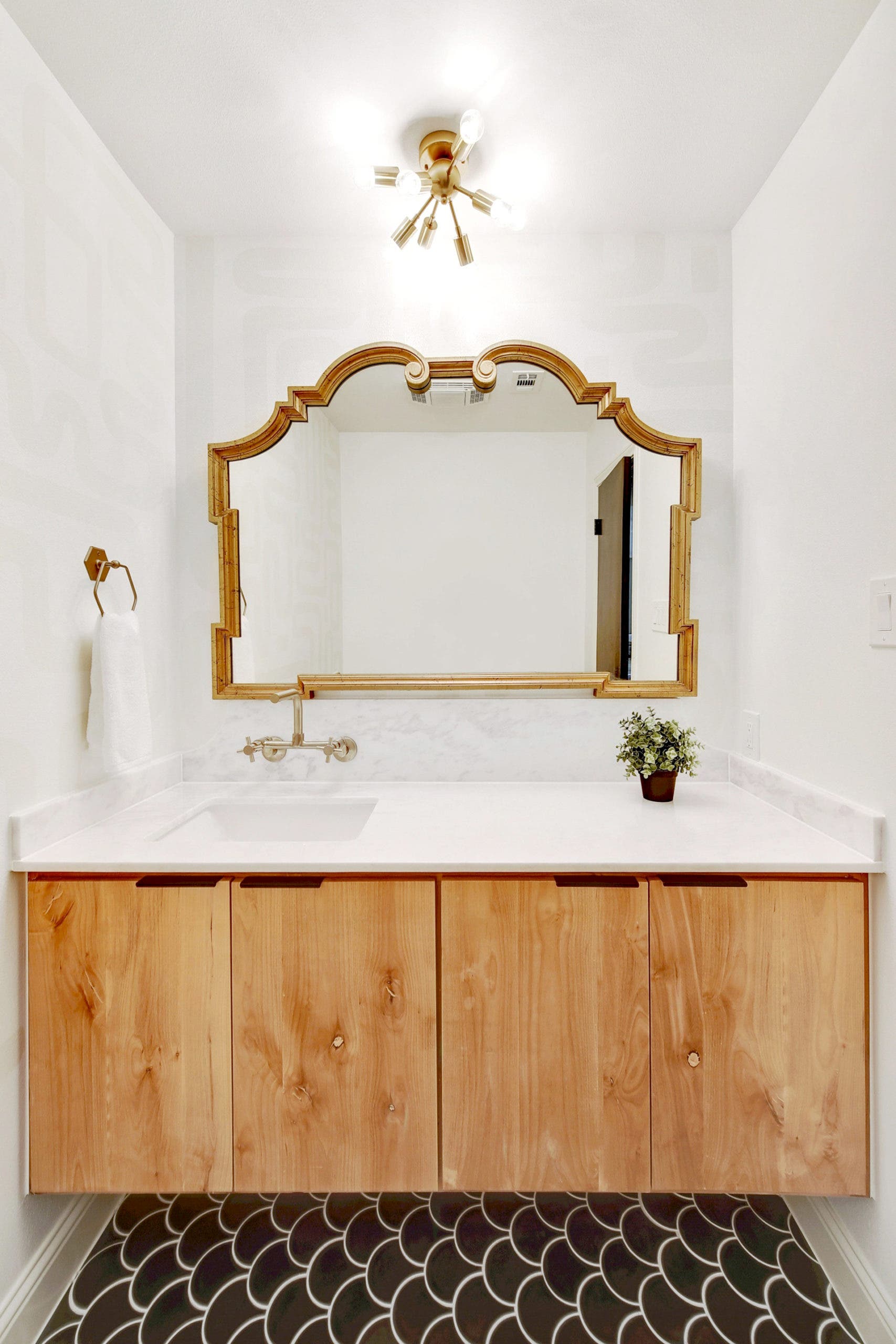 How Lighting Fixtures Enhance the Finishes in the Bathroom