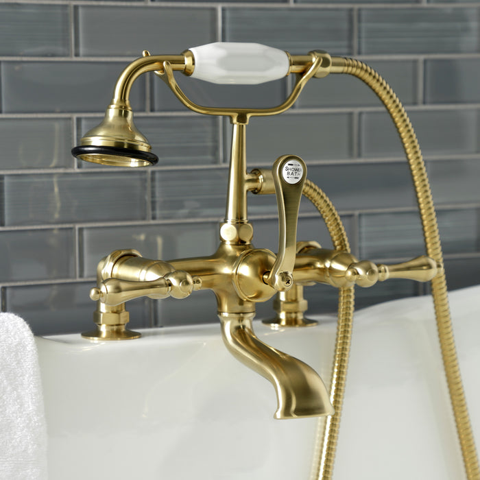 Kingston Heirloom AE203T7 - Aqua Vintage Three-Handle 2-Hole Deck-Mount Clawfoot Tub Faucet with Hand Shower, Brushed Brass