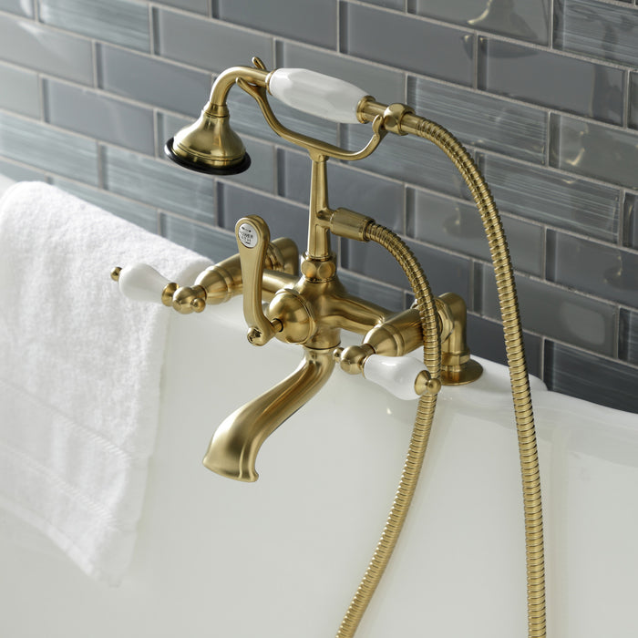 Kingston Heirloom AE205T7 - Aqua Vintage Three-Handle 2-Hole Deck-Mount Clawfoot Tub Faucet with Hand Shower, Brushed Brass