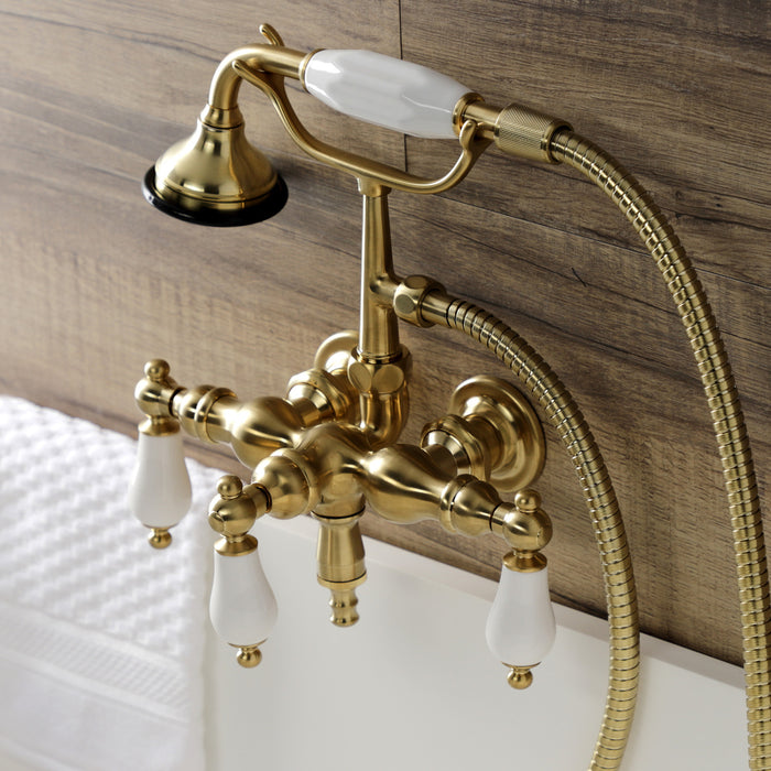 Kingston Heirloom AE23T7 - Aqua Vintage Three-Handle 2-Hole Tub Wall Mount Clawfoot Tub Faucet with Hand Shower, Brushed Brass