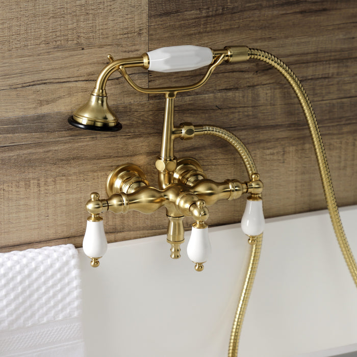 Kingston Heirloom AE23T7 - Aqua Vintage Three-Handle 2-Hole Tub Wall Mount Clawfoot Tub Faucet with Hand Shower, Brushed Brass