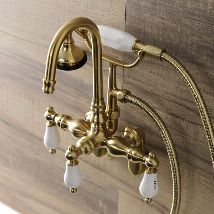 Kingston Heirloom AE303T7 - Aqua Vintage Three-Handle 2-Hole Tub Wall Mount Clawfoot Tub Faucet with Hand Shower, Brushed Brass