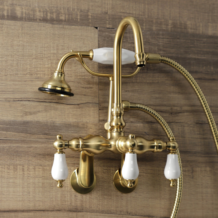 Kingston Heirloom AE305T7 - Aqua Vintage Three-Handle 2-Hole Tub Wall Mount Clawfoot Tub Faucet with Hand Shower, Brushed Brass