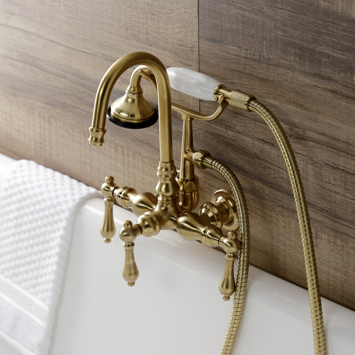Kingston Heirloom AE7T7 - Aqua Vintage Three-Handle 2-Hole Tub Wall Mount Clawfoot Tub Faucet with Hand Shower, Brushed Brass