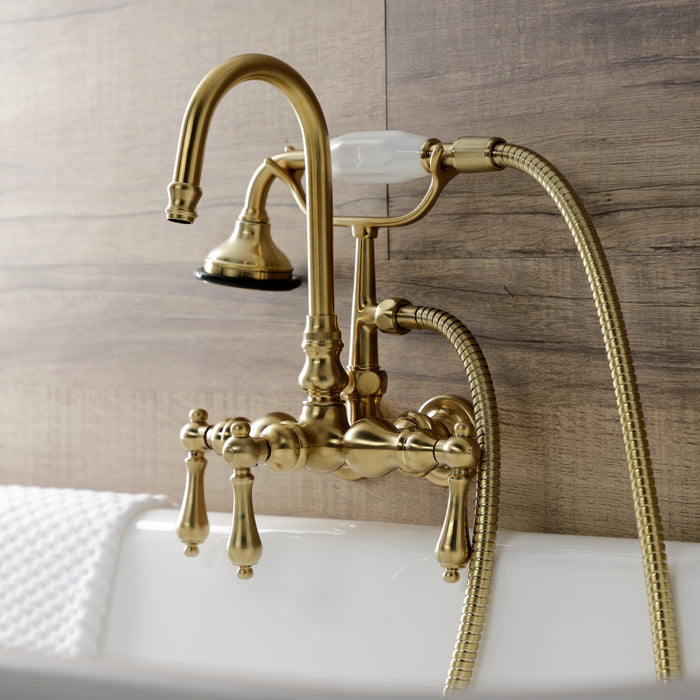 Kingston Heirloom AE7T7 - Aqua Vintage Three-Handle 2-Hole Tub Wall Mount Clawfoot Tub Faucet with Hand Shower, Brushed Brass