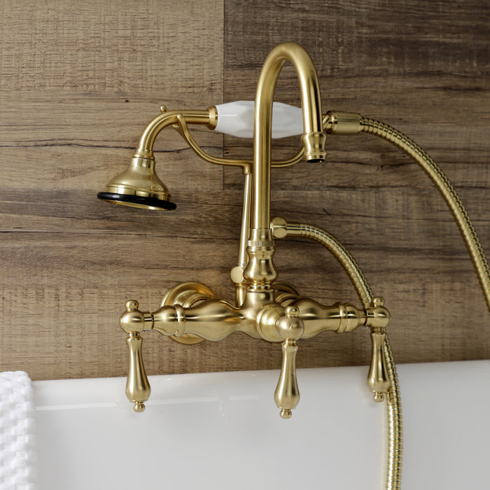 Kingston Heirloom AE7T7 - Aqua Vintage Three-Handle 2-Hole Tub Wall Mount Clawfoot Tub Faucet with Hand Shower, Brushed Brass