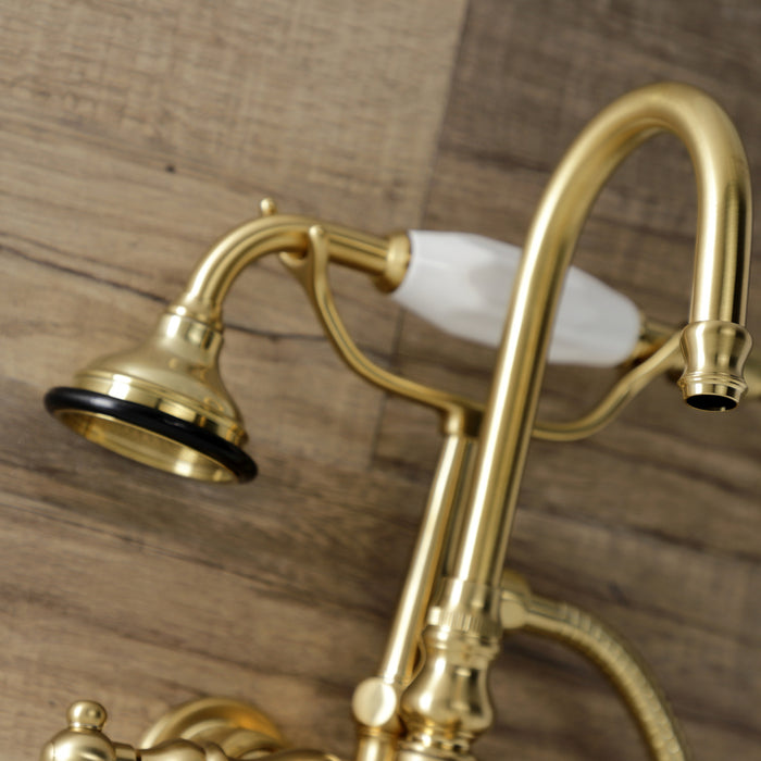 Kingston Heirloom AE9T7 - Aqua Vintage Three-Handle 2-Hole Tub Wall Mount Clawfoot Tub Faucet with Hand Shower, Brushed Brass