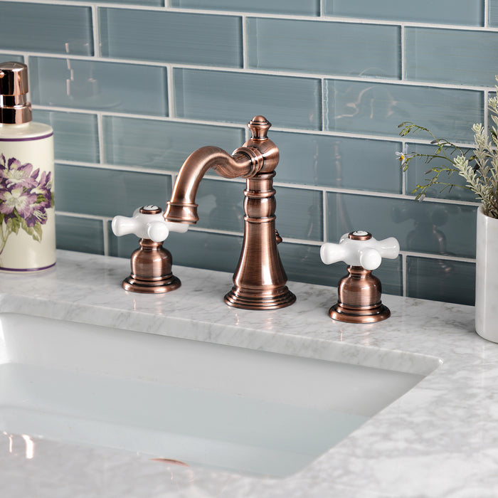 Kingston Heirloom FSC197PXAC - American Classic Two-Handle 3-Hole Deck Mount Widespread Bathroom Faucet with Brass Pop-Up, Antique Copper