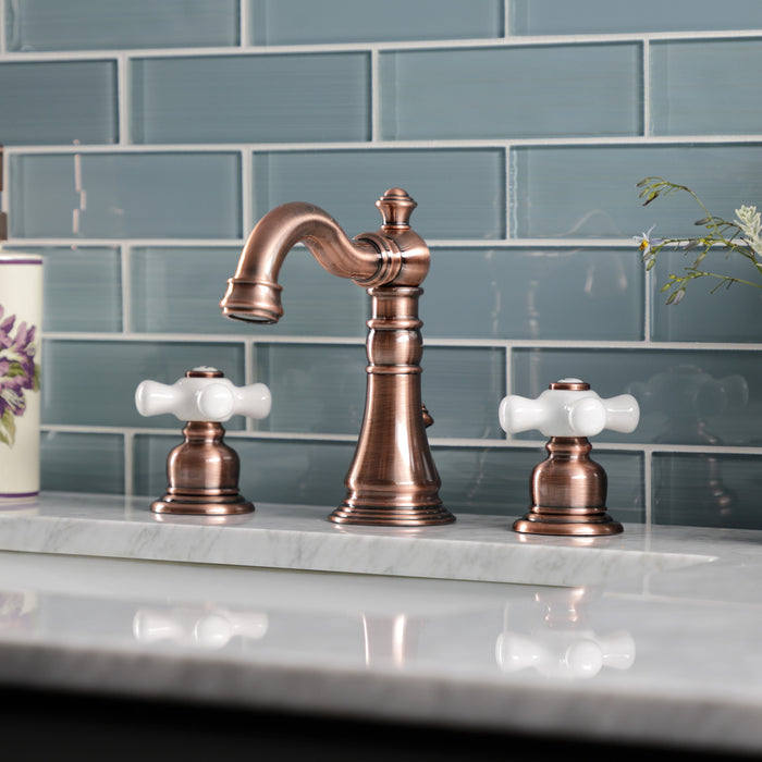 Kingston Heirloom FSC197PXAC - American Classic Two-Handle 3-Hole Deck Mount Widespread Bathroom Faucet with Brass Pop-Up, Antique Copper