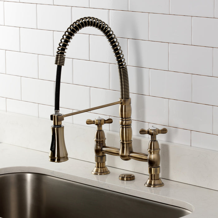 Kingston Tulare GS1273BEX - Essex Double-Handle 2-Hole Deck-Mount Pre-Rinse Bridge Kitchen Faucet, Antique Brass