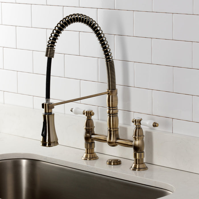 Kingston Tulare GS1273BPL - Bel-Air Double-Handle 2-Hole Deck-Mount Pre-Rinse Bridge Kitchen Faucet, Antique Brass