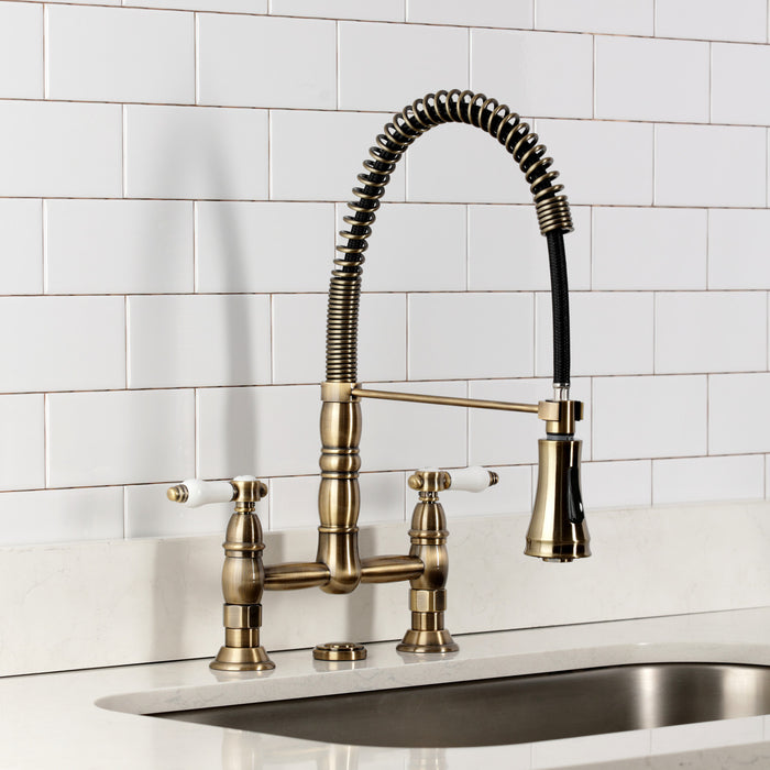 Kingston Tulare GS1273BPL - Bel-Air Double-Handle 2-Hole Deck-Mount Pre-Rinse Bridge Kitchen Faucet, Antique Brass