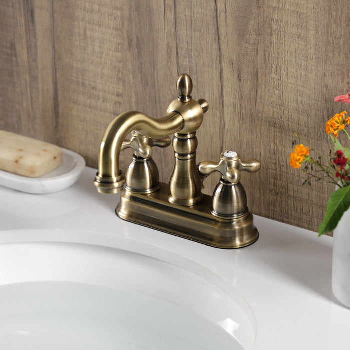 Kingston Heirloom KB1603AX - Heritage Double-Handle 3-Hole Deck Mount 4-Inch Centerset Bathroom Faucet with Pop-Up Drain, Antique Brass