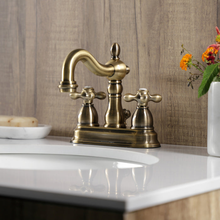 Kingston Heirloom KB1603AX - Heritage Double-Handle 3-Hole Deck Mount 4-Inch Centerset Bathroom Faucet with Pop-Up Drain, Antique Brass