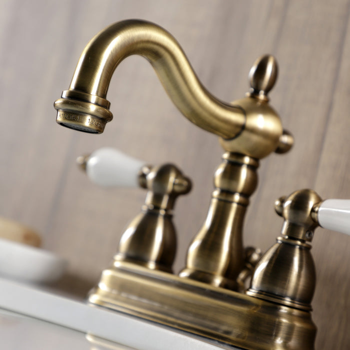 Kingston Heirloom KB1603PL - Heritage Double-Handle 3-Hole Deck Mount 4-Inch Centerset Bathroom Faucet with Pop-Up Drain, Antique Brass