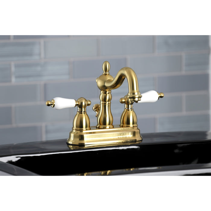 Kingston Heirloom KB1607PL - Heritage Double-Handle 3-Hole Deck Mount 4-Inch Centerset Bathroom Faucet with Pop-Up Drain, Brushed Brass