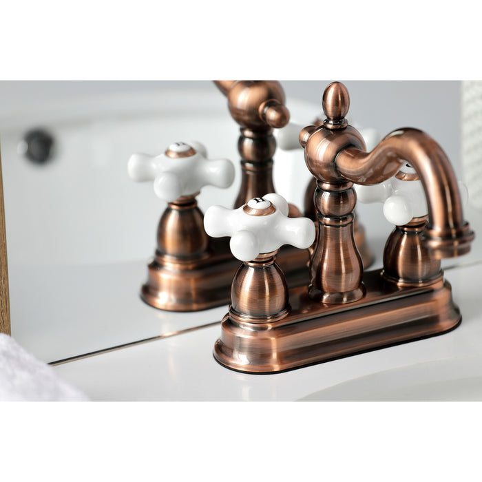Kingston Heirloom KB160PXAC - Heritage Double-Handle 3-Hole Deck Mount 4-Inch Centerset Bathroom Faucet with Pop-Up Drain, Antique Copper