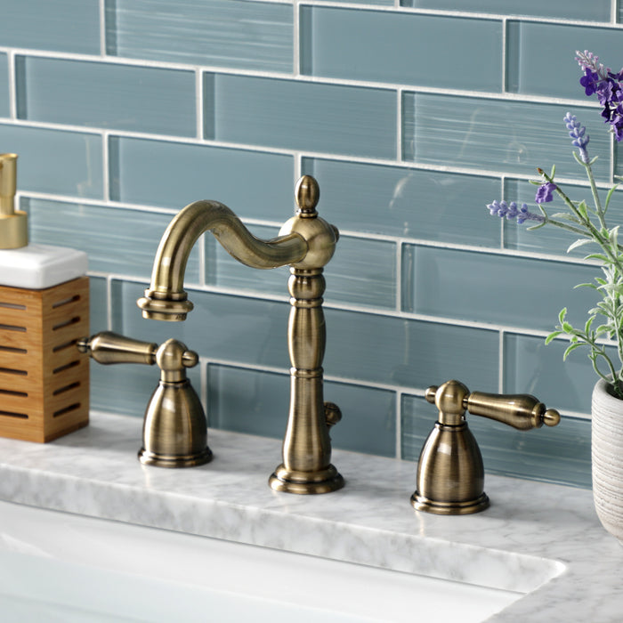 Kingston Heirloom KB1973AL - Heritage Two-Handle 3-Hole Deck Mount Widespread Bathroom Faucet with Brass Pop-Up, Antique Brass