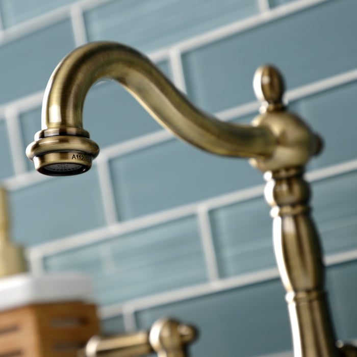 Kingston Heirloom KB1973PX - Heritage Two-Handle 3-Hole Deck Mount Widespread Bathroom Faucet with Brass Pop-Up, Antique Brass