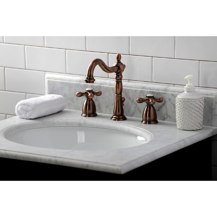 Kingston Heirloom KB197AXAC - Heritage Two-Handle 3-Hole Deck Mount Widespread Bathroom Faucet with Brass Pop-Up, Antique Copper