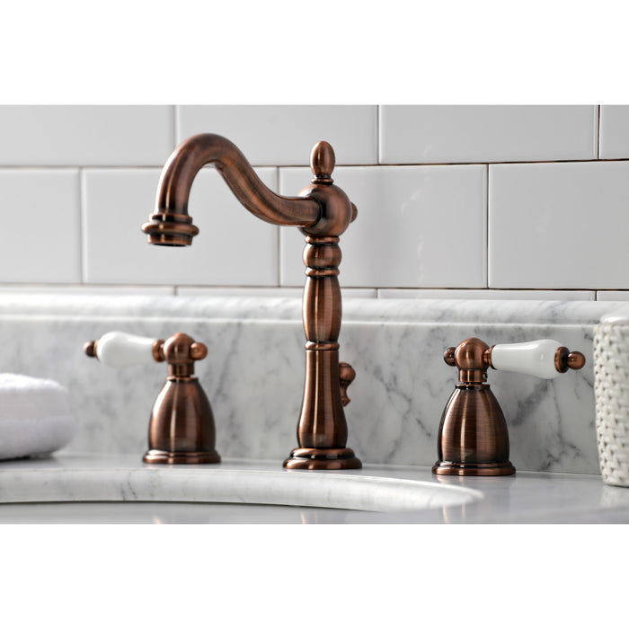 Kingston Heirloom KB197PLAC - Heritage Two-Handle 3-Hole Deck Mount Widespread Bathroom Faucet with Brass Pop-Up, Antique Copper