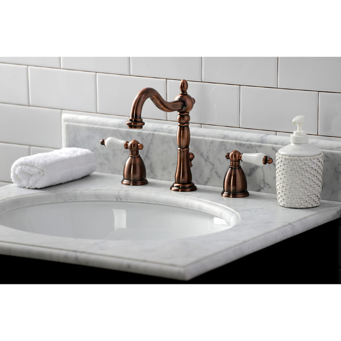 Kingston Heirloom KB197PLAC - Heritage Two-Handle 3-Hole Deck Mount Widespread Bathroom Faucet with Brass Pop-Up, Antique Copper