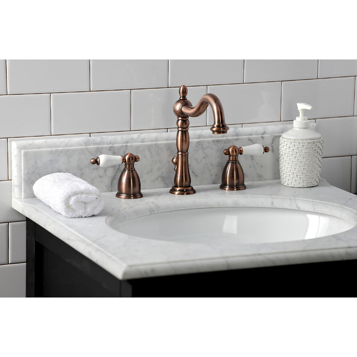 Kingston Heirloom KB197PLAC - Heritage Two-Handle 3-Hole Deck Mount Widespread Bathroom Faucet with Brass Pop-Up, Antique Copper
