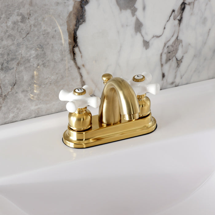 Kingston Heirloom KB5617PX - Restoration Double-Handle 3-Hole Deck Mount 4-Inch Centerset Bathroom Faucet with Pop-Up Drain, Brushed Brass