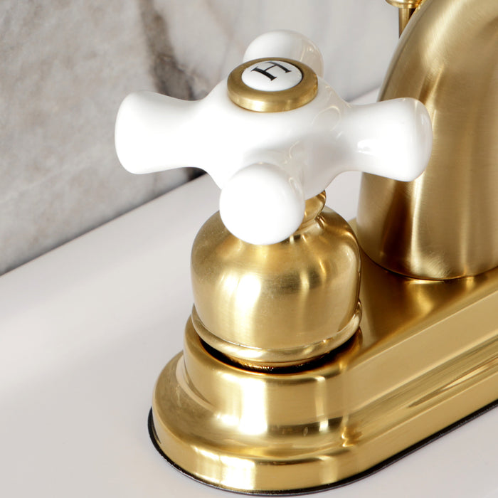 Kingston Heirloom KB5617PX - Restoration Double-Handle 3-Hole Deck Mount 4-Inch Centerset Bathroom Faucet with Pop-Up Drain, Brushed Brass