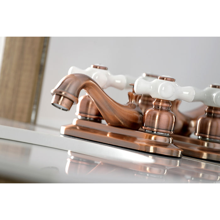 Kingston Heirloom KB606PX - Restoration Double-Handle 3-Hole Deck Mount 4-Inch Centerset Bathroom Faucet with Pop-Up Drain, Antique Copper