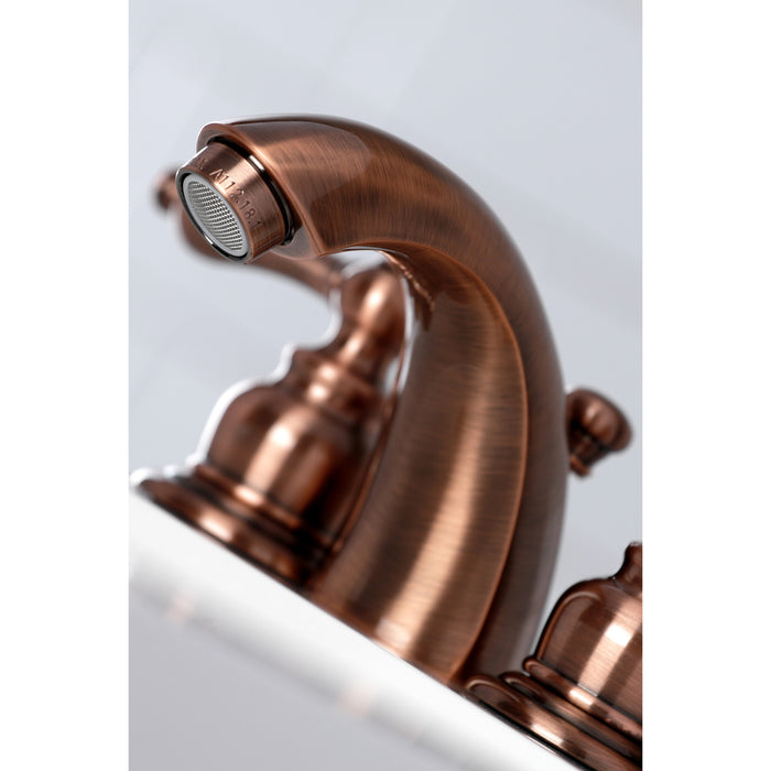 Kingston Heirloom KB946AL - Victorian Two-Handle 3-Hole Deck Mount Mini-Widespread Bathroom Faucet with Pop-Up Drain, Antique Copper