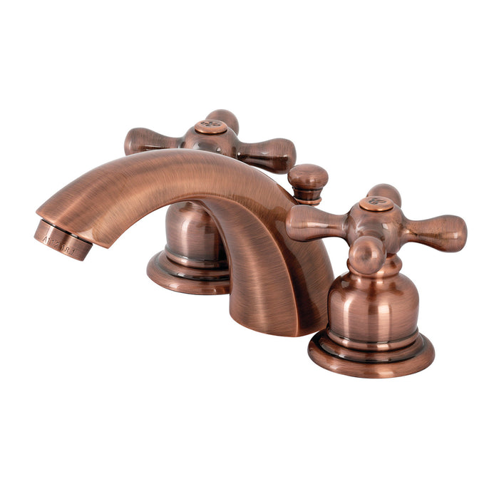Kingston Heirloom KB946AX - Victorian Two-Handle 3-Hole Deck Mount Mini-Widespread Bathroom Faucet with Pop-Up Drain, Antique Copper