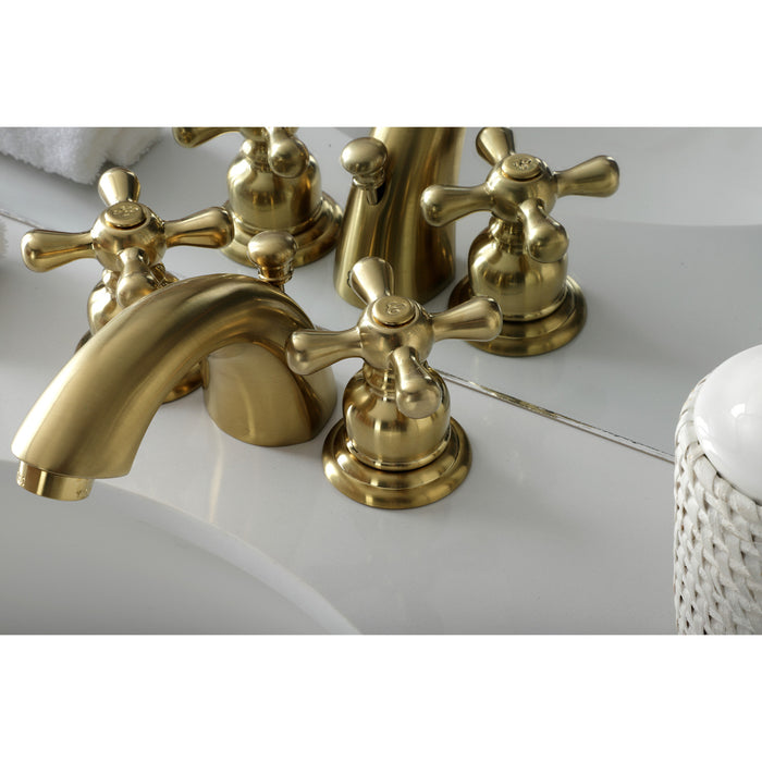 Kingston Heirloom KB947AXSB - Victorian Two-Handle 3-Hole Deck Mount Mini-Widespread Bathroom Faucet with Pop-Up Drain, Brushed Brass