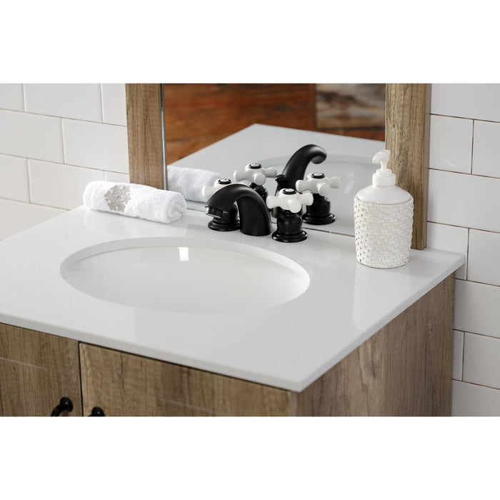 Kingston Heirloom KB950PX - Victorian Two-Handle 3-Hole Deck Mount Mini-Widespread Bathroom Faucet with Pop-Up Drain, Matte Black
