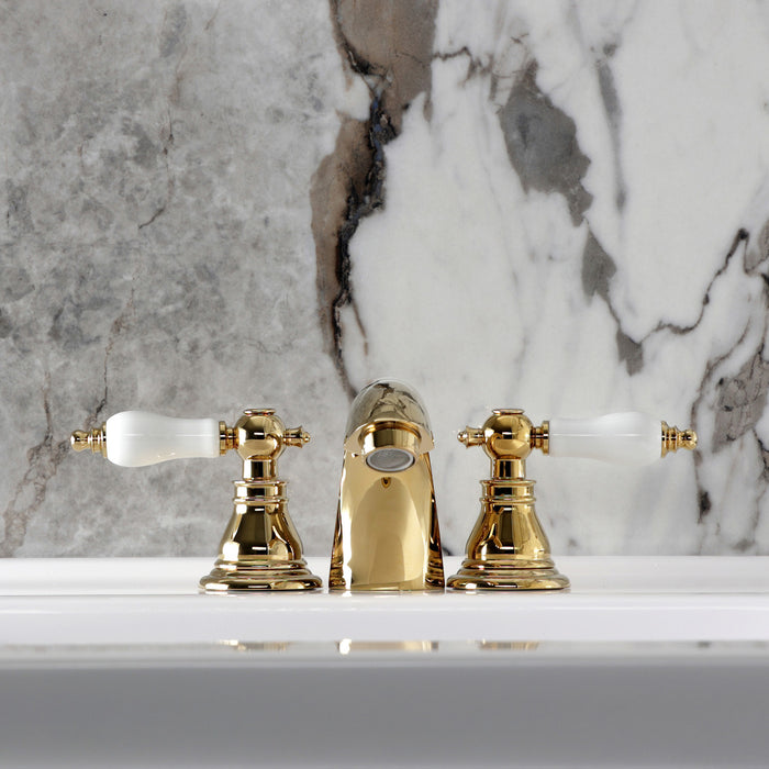 Kingston Tulare KB952APL - American Patriot Two-Handle 3-Hole Deck Mount Mini-Widespread Bathroom Faucet with Pop-Up Drain, Polished Brass