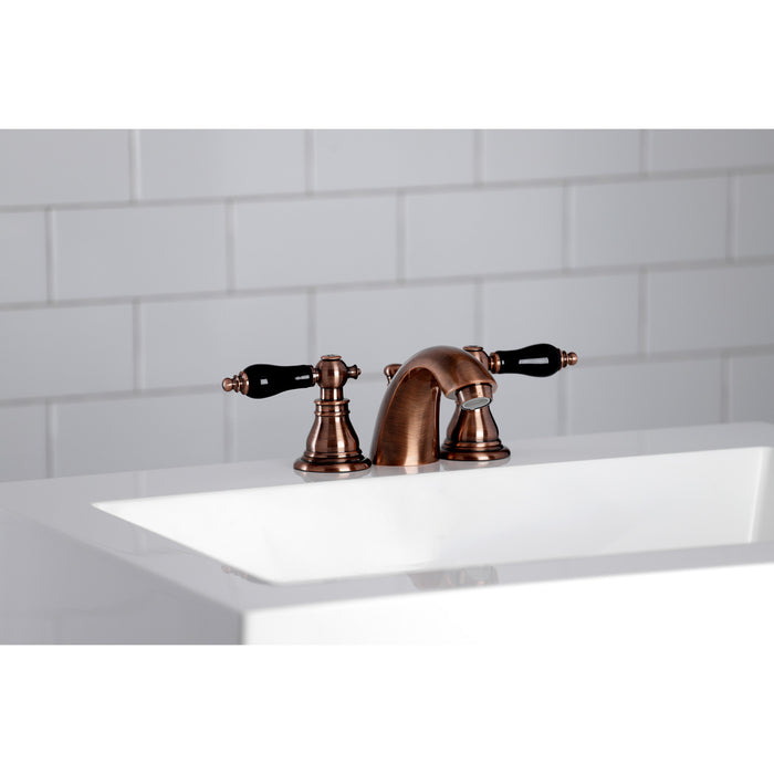 Kingston Heirloom KB956AKL - Duchess Two-Handle 3-Hole Deck Mount Mini-Widespread Bathroom Faucet with Pop-Up Drain, Antique Copper