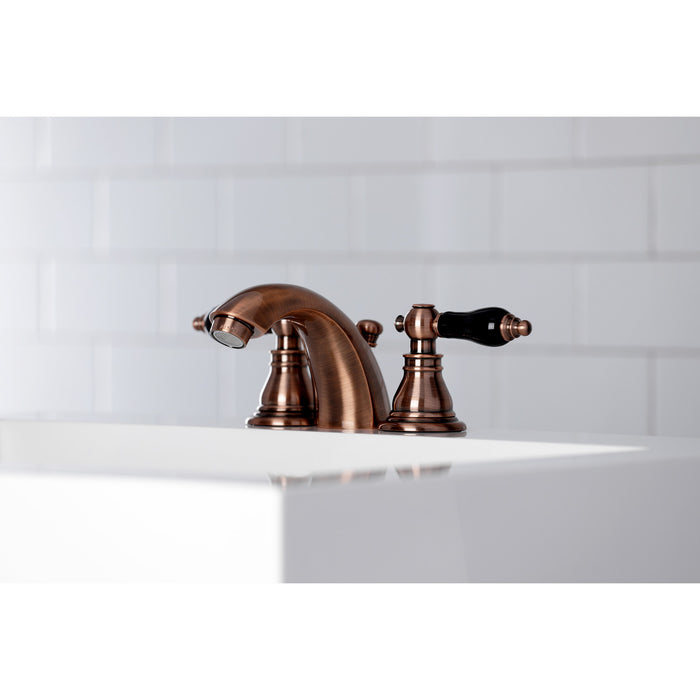 Kingston Heirloom KB956AKL - Duchess Two-Handle 3-Hole Deck Mount Mini-Widespread Bathroom Faucet with Pop-Up Drain, Antique Copper