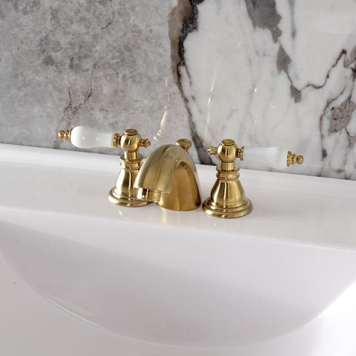 Kingston Tulare KB957APLSB - American Patriot Two-Handle 3-Hole Deck Mount Mini-Widespread Bathroom Faucet with Pop-Up Drain, Brushed Brass