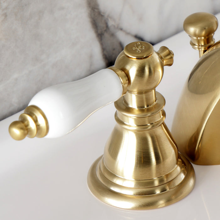 Kingston Tulare KB957APLSB - American Patriot Two-Handle 3-Hole Deck Mount Mini-Widespread Bathroom Faucet with Pop-Up Drain, Brushed Brass