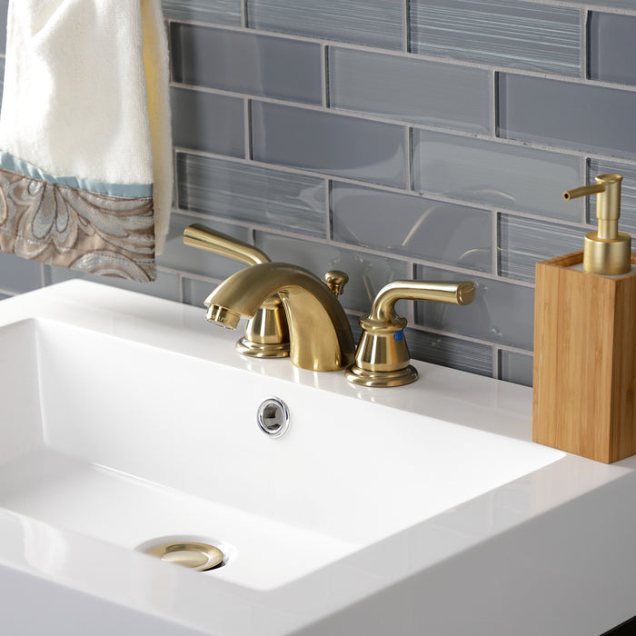 Kingston Tulare KB957RXLSB - Restoration Two-Handle 3-Hole Deck Mount Mini-Widespread Bathroom Faucet with Pop-Up Drain, Brushed Brass