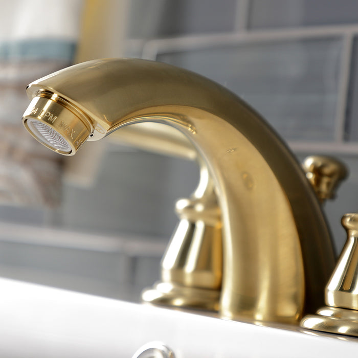 Kingston Tulare KB957RXLSB - Restoration Two-Handle 3-Hole Deck Mount Mini-Widespread Bathroom Faucet with Pop-Up Drain, Brushed Brass