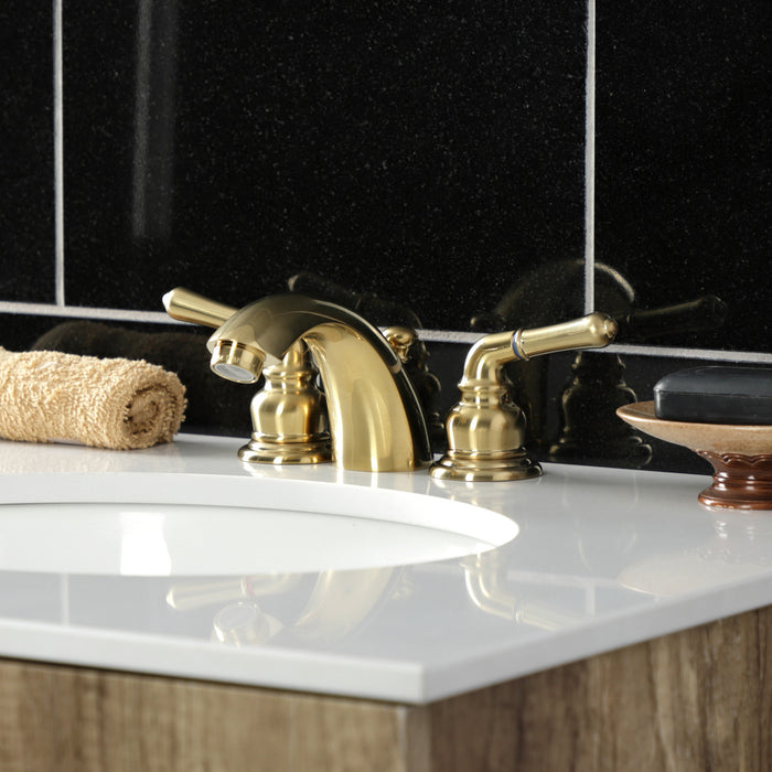 Kingston Tulare KB957SB - Magellan Two-Handle 3-Hole Deck Mount Mini-Widespread Bathroom Faucet with Pop-Up Drain, Brushed Brass