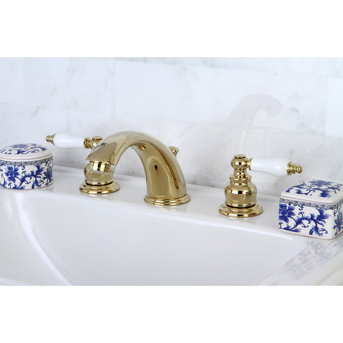 Kingston Heirloom KB972PLB - Victorian Two-Handle 3-Hole Deck Mount Widespread Bathroom Faucet with Brass Pop-Up, Polished Brass
