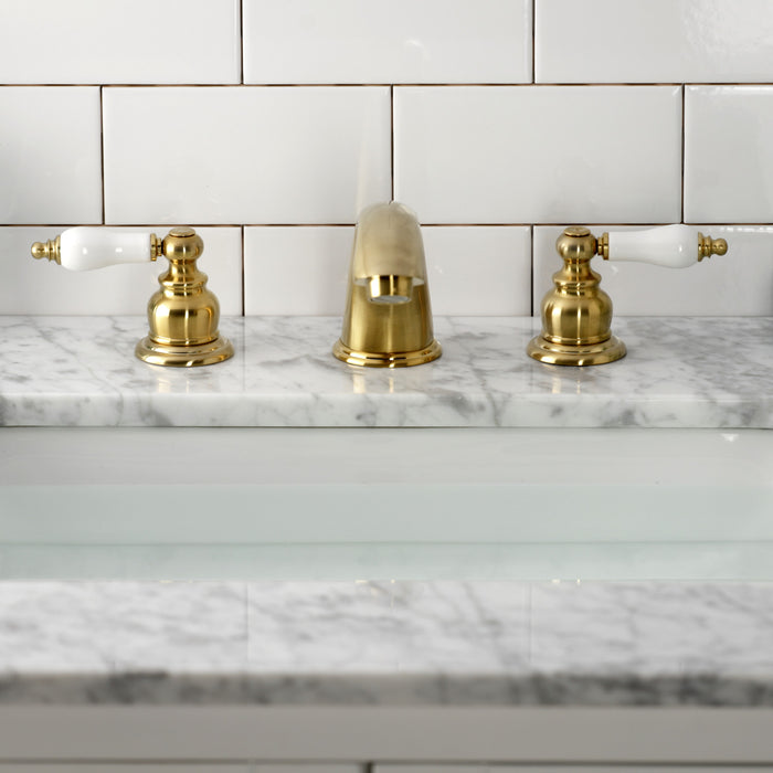 Kingston Heirloom KB977B - Victorian Two-Handle 3-Hole Deck Mount Widespread Bathroom Faucet with Pop-Up Drain, Brushed Brass