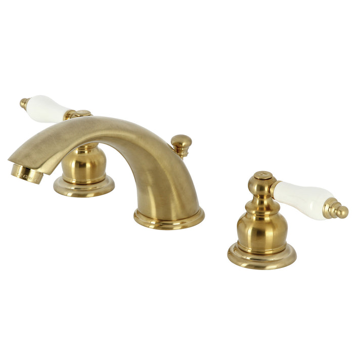 Kingston Heirloom KB977B - Victorian Two-Handle 3-Hole Deck Mount Widespread Bathroom Faucet with Pop-Up Drain, Brushed Brass