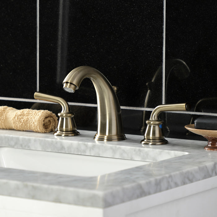 Kingston Tulare KB983RXLAB - Restoration Two-Handle 3-Hole Deck Mount Widespread Bathroom Faucet with Pop-Up Drain, Antique Brass
