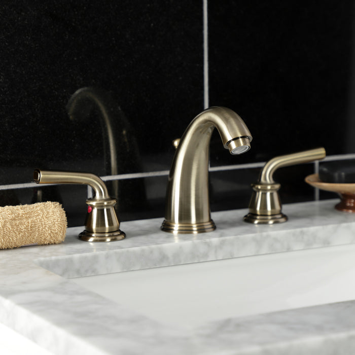 Kingston Tulare KB983RXLAB - Restoration Two-Handle 3-Hole Deck Mount Widespread Bathroom Faucet with Pop-Up Drain, Antique Brass