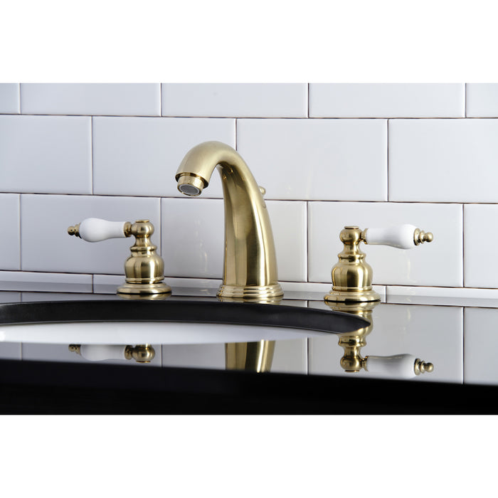 Kingston Heirloom KB987PLSB - Victorian Two-Handle 3-Hole Deck Mount Widespread Bathroom Faucet with Pop-Up Drain, Brushed Brass
