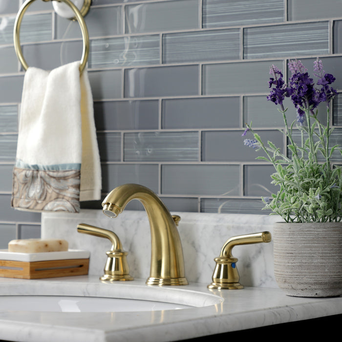 Kingston Tulare KB987RXLSB - Restoration Two-Handle 3-Hole Deck Mount Widespread Bathroom Faucet with Pop-Up Drain, Brushed Brass