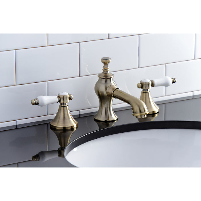 Kingston Tulare KC7063BPL - Bel-Air Two-Handle 3-Hole Deck Mount Widespread Bathroom Faucet with Brass Pop-Up, Antique Brass